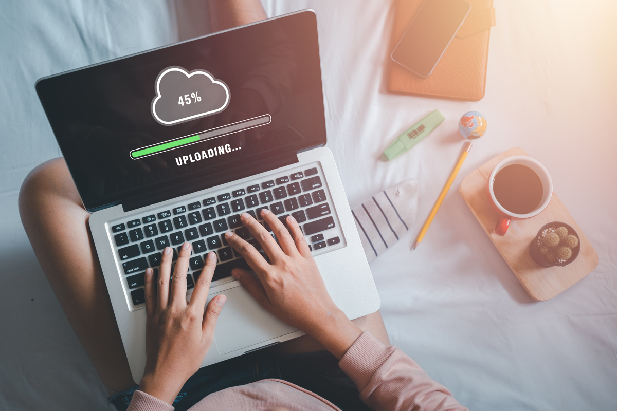 Upload data concept, Woman using laptop computer and waiting for